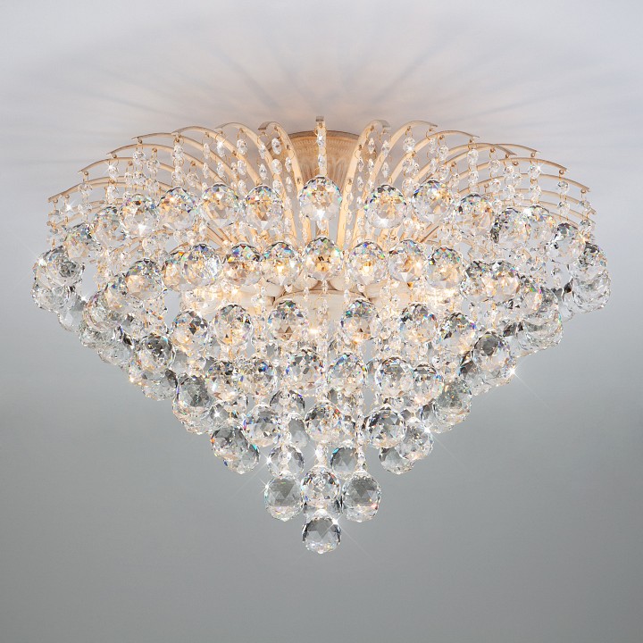 Потолочная люстра Eurosvet Ostiniya 3299/9 белый с золотом/прозрачный хрусталь Strotskis